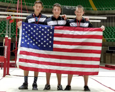 boys holding american flag