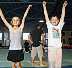 cheer students with hands up