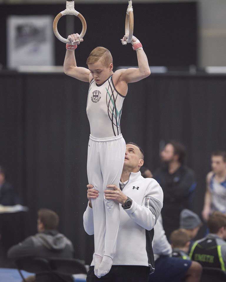 boy on rings